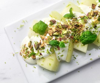 Melonskiver med kesam og pistasjnøtter 